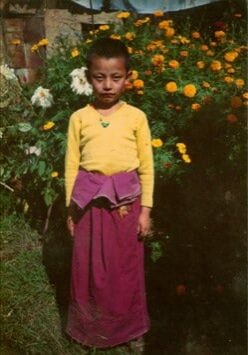 Rinpoche at eight years.